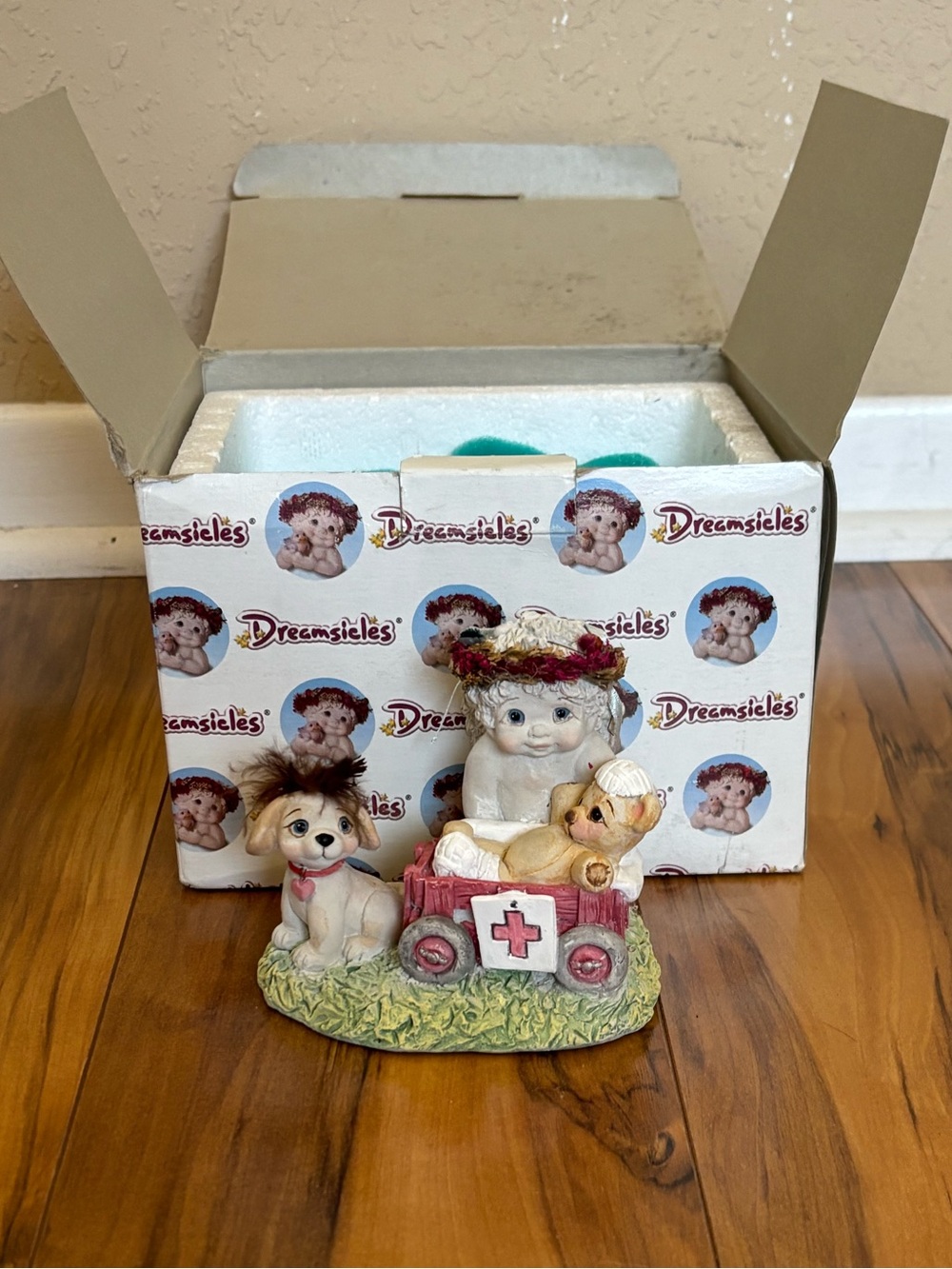 1999 collectable Dreamsicles Figurine — angel with medical wagon bear and dog.